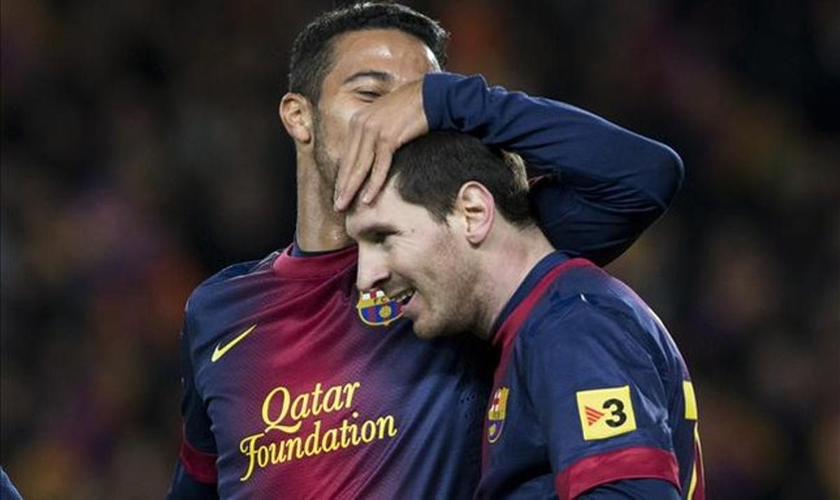 Thiago, amb Messi.