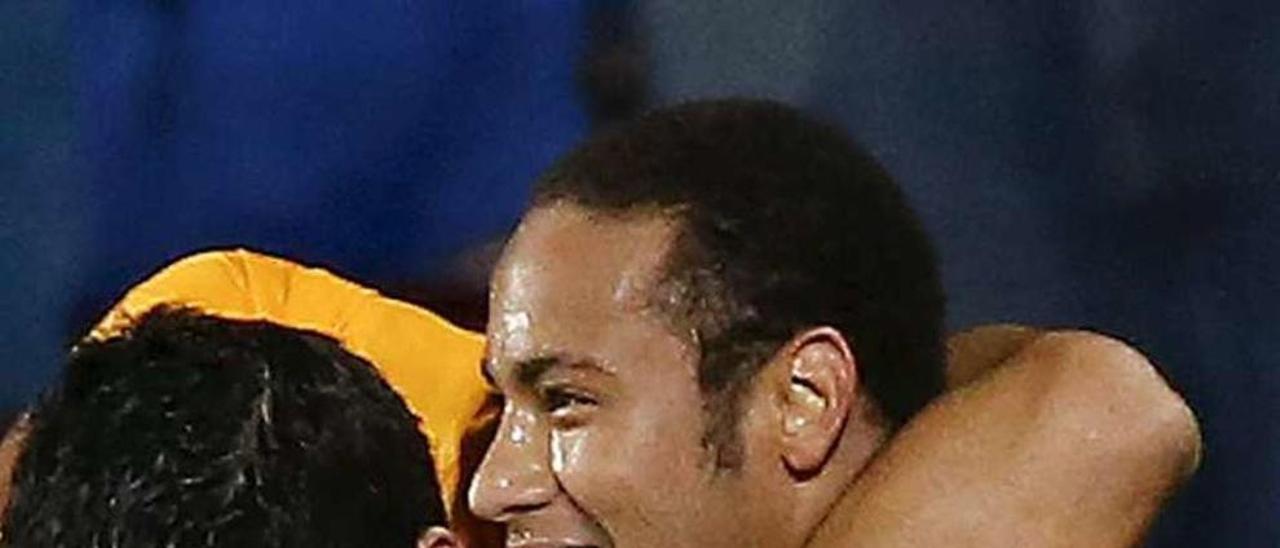 Luis Suárez y Messi celebran el primer gol del Barça en Getafe.