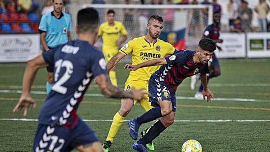 Una acció del Llagostera-Vila-real B de la passada jornada.