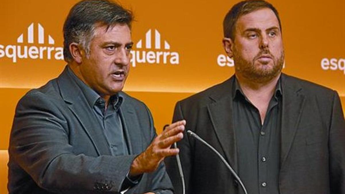 Joan Puigcercós y Oriol Junqueras, ayer en la sede de ERC.