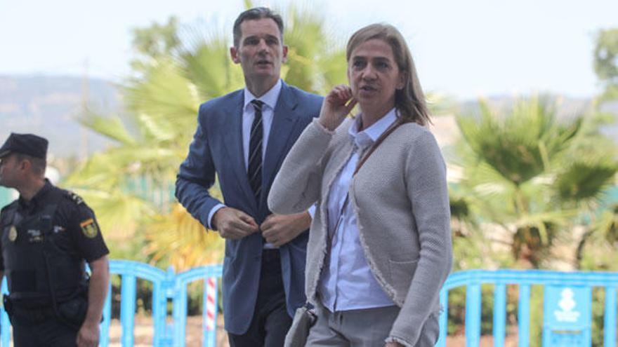 La Infanta e Inñaki Urdangarin llegando hoy al juicio del Caso Nóos.