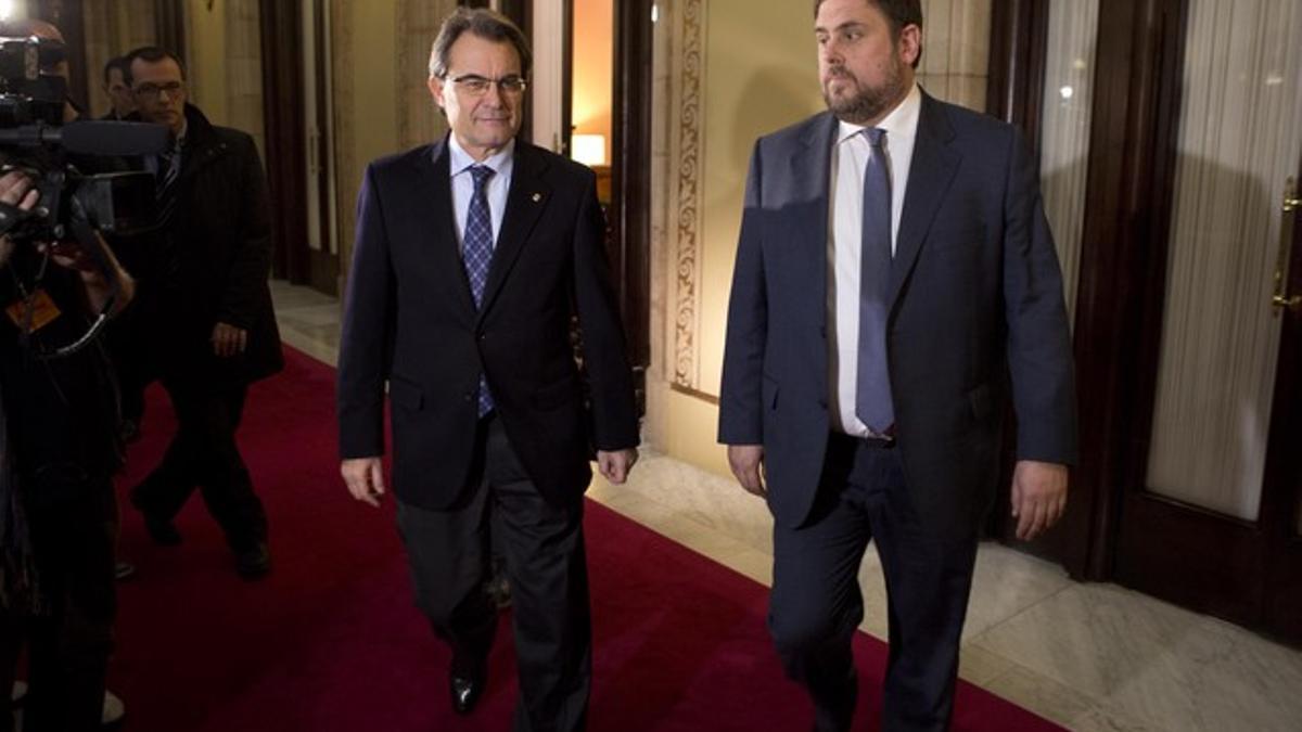 Artur Mas y Oriol Junqueras salen del despacho del 'president' antes de firmar el acuerdo de estabilidad, el pasado 19 de diciembre.