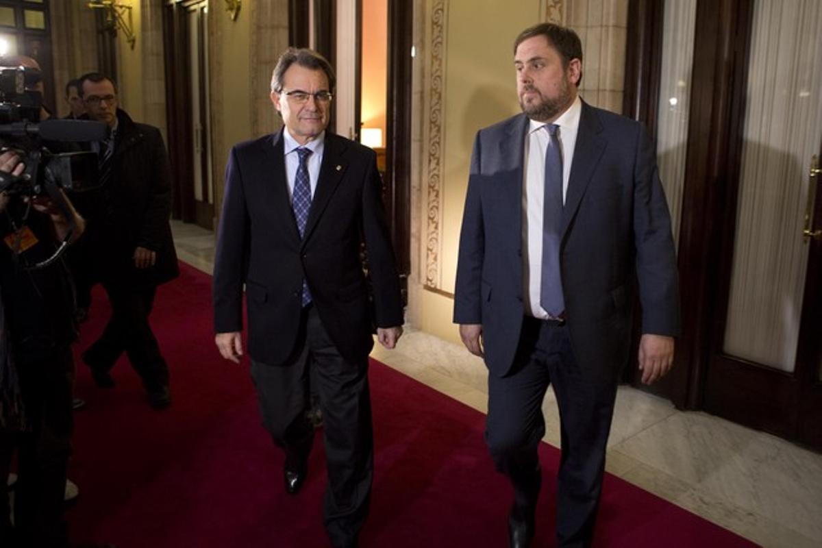 Artur Mas i Oriol Junqueras surten del despatx del president abans de firmar l’acord d’estabilitat, el 19 de desembre passat.