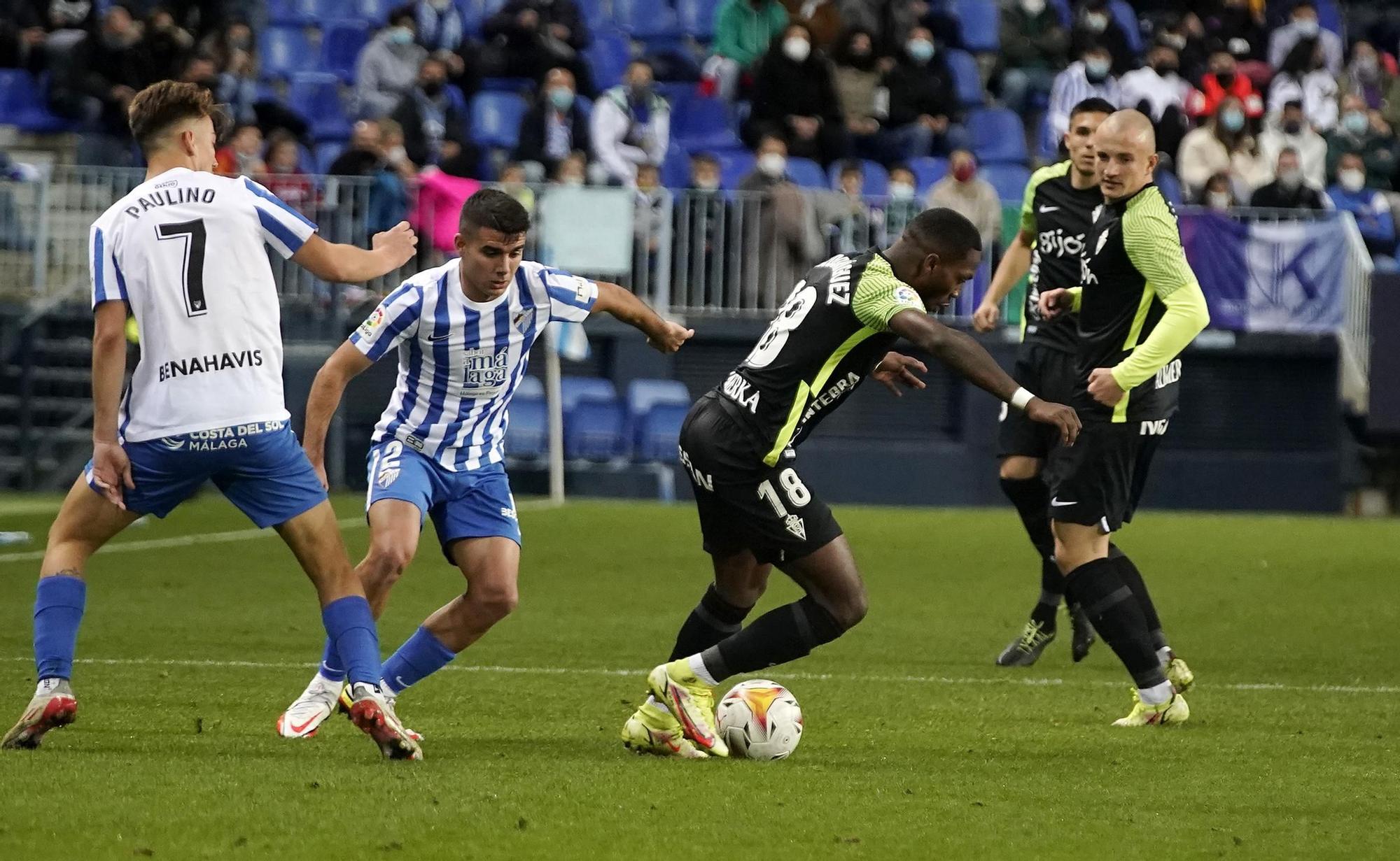El partido del Sporting en Málaga, en imágenes