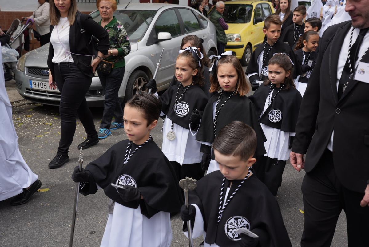 La salida procesional de la Presentación al pueblo de Jesús de los Afligidos, en imágenes