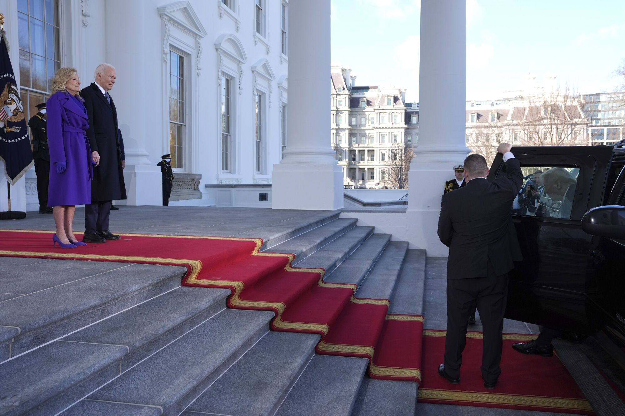 President Joe Biden, second left, and first lady Jill Biden, left, greet President-elect Donald Trump upon arriving at the White House, Monday, Jan. 20, 2025, in Washington. (AP Photo/Evan Vucci)