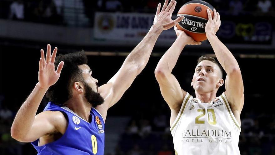 Un triple de oro de Carroll rescata al Real Madrid (86-85)