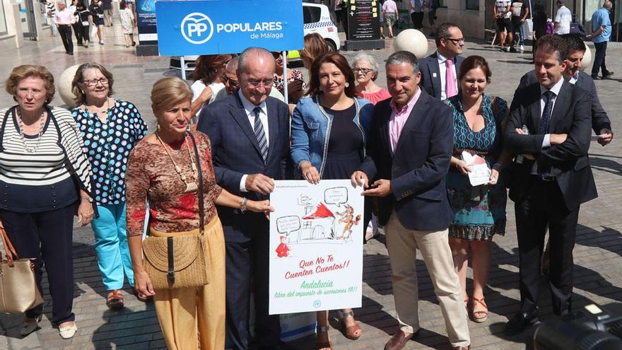 El PP lanza una nueva campaña contra el impuesto de sucesiones en la calle Larios.