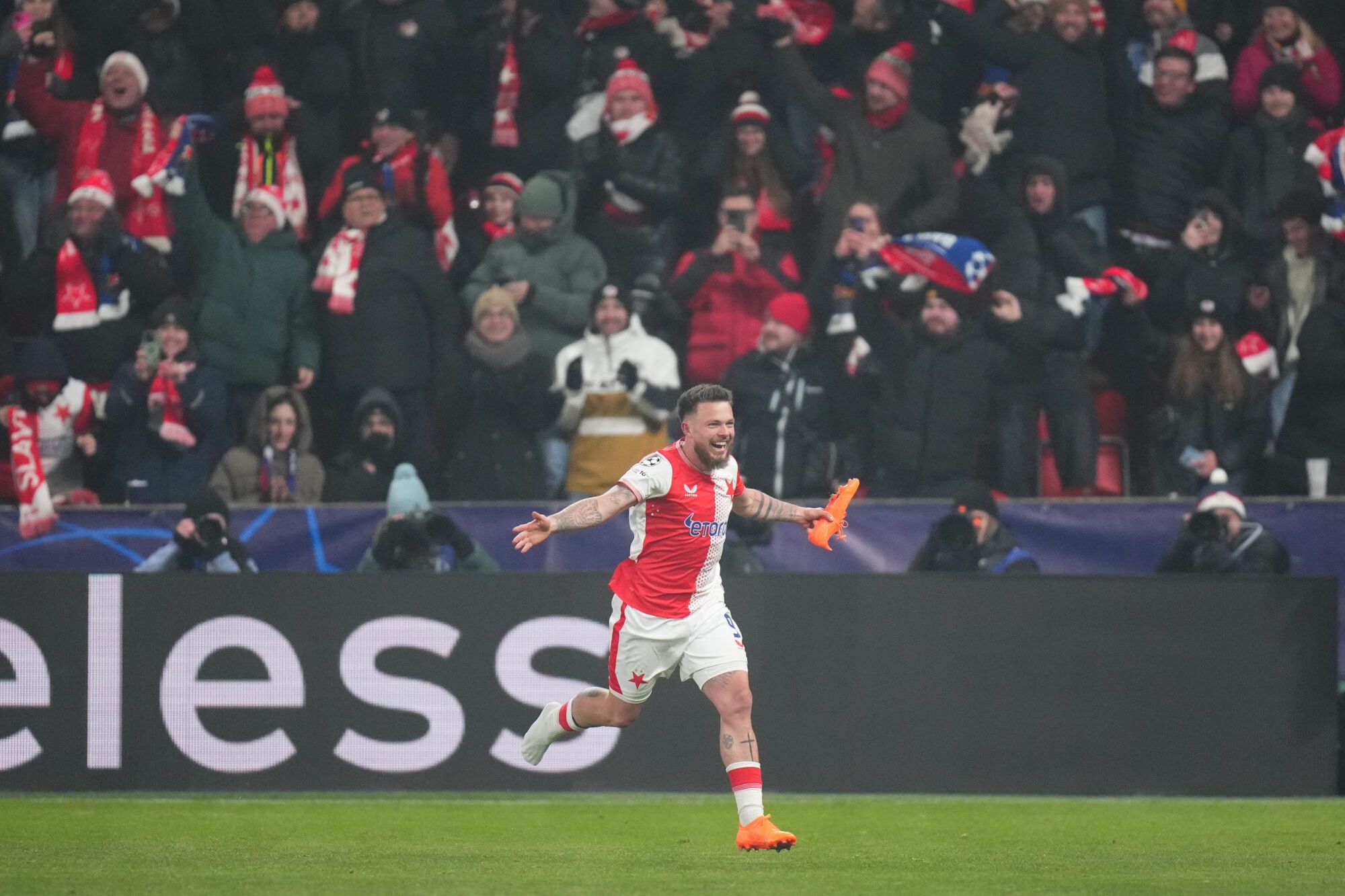 Slavia's Vasil Kusej celebrates after scoring his side's opening goal during the Champions League opening phase soccer match between Slavia Prague and Barcelona in Prague, Czech Republic, Wednesday, Jan. 21, 2026. (AP Photo/Petr David Josek). EDITORIAL USE ONLY/ONLY ITALY AND SPAIN