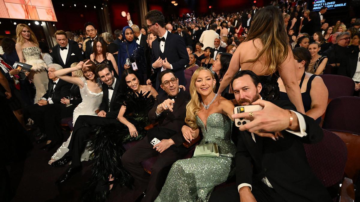 This handout picture courtesy of the Academy of Motion Picture Arts and Sciencies (AMPAS) shows from L to R US-Australian actress Nicole Kidman, US actress Emma Stone, Dave Macary, US actress Demi Moore, Jason Weinberg, US actress Kate Hudson and Danny Fujikawa during the 98th Annual Academy Awards at the Dolby Theatre in Hollywood, California on March 15, 2026. (Photo by Richard Harbaugh / The Academy / AFP) / RESTRICTED TO EDITORIAL USE - MANDATORY CREDIT "AFP PHOTO / The Academy" - NO MARKETING NO ADVERTISING CAMPAIGNS - DISTRIBUTED AS A SERVICE TO CLIENTS