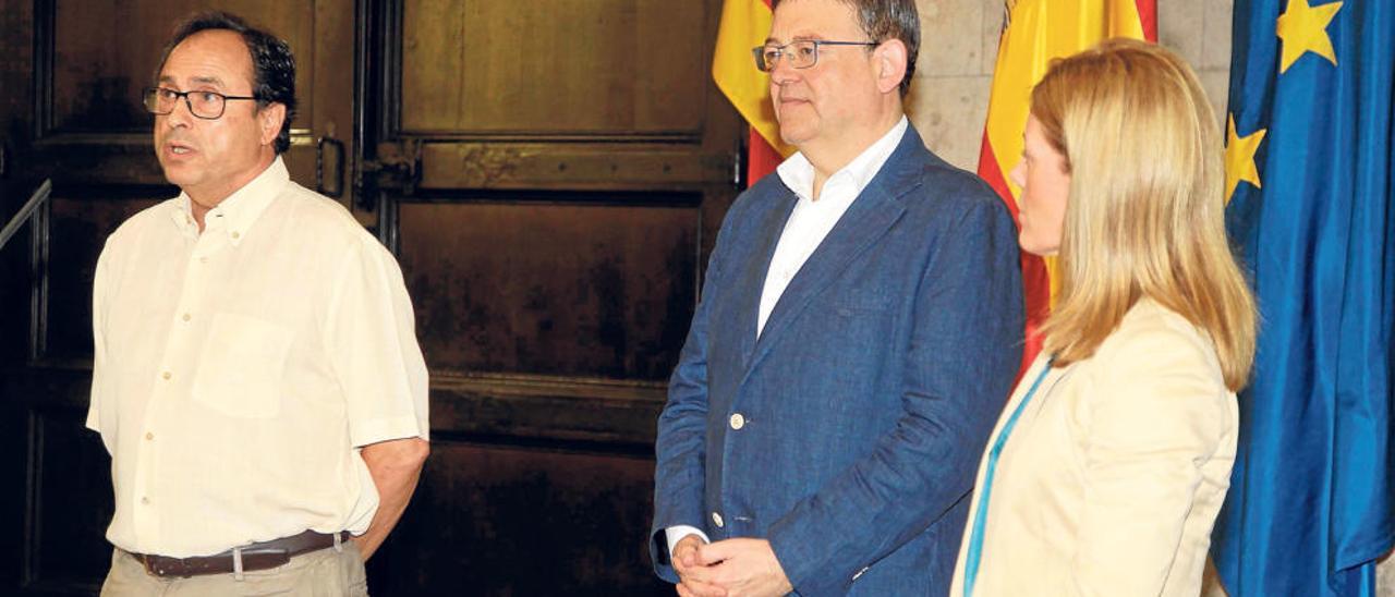 El presidente Puig, entre el conseller Soler y la secretaria autonómica de Hacienda, Clara Ferrando, en su comparecencia del sábado.