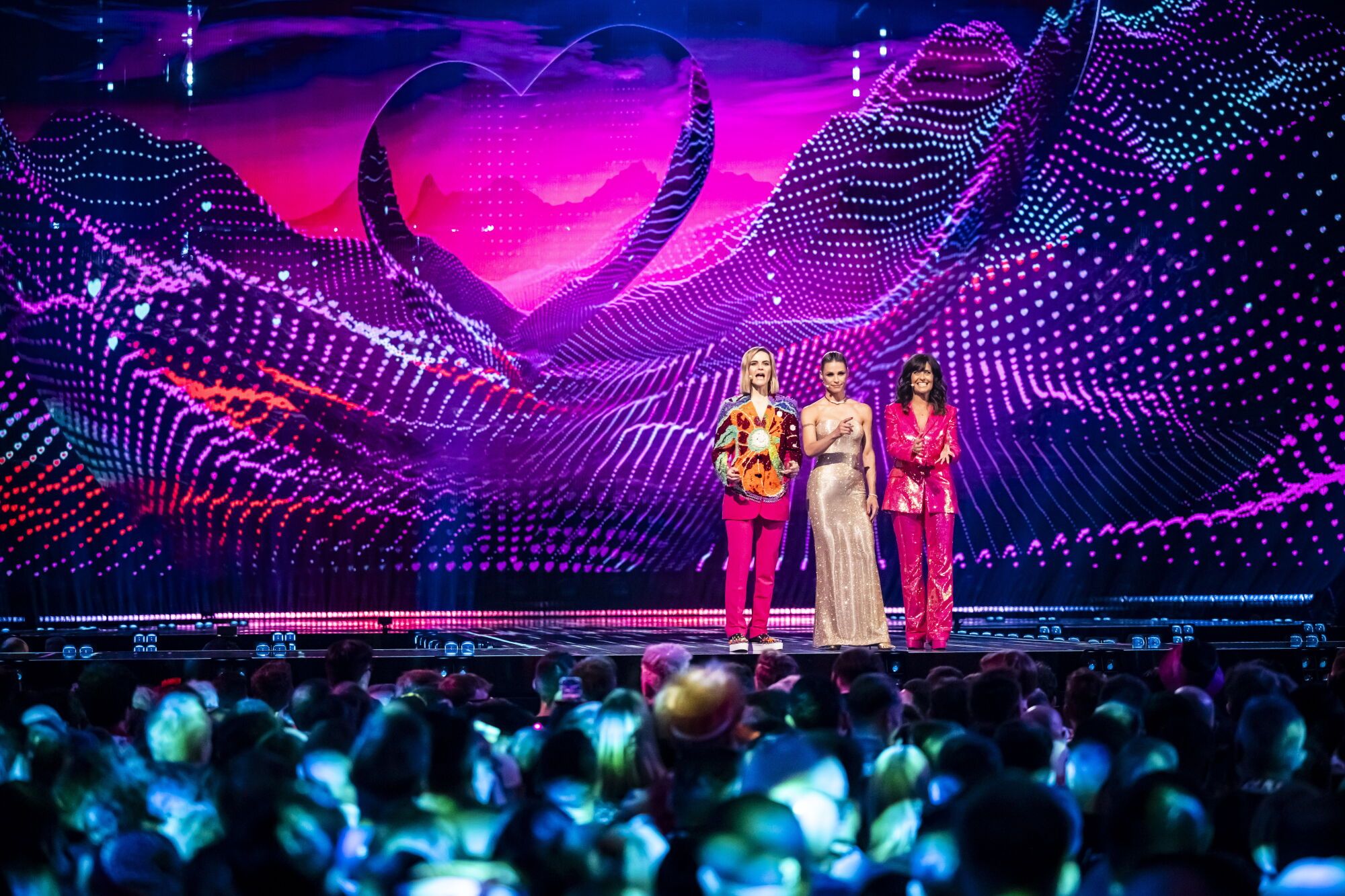 BASEL (Switzerland), 17/05/2025.- (L-R) The hosts Hazel Brugger, Michelle Hunziker and Sandra Studer speak during the grand final of the 69th Eurovision Song Contest (ESC) in Basel, Switzerland, 17 May 2025. (Suiza, Basilea) EFE/EPA/GEORGIOS KEFALAS