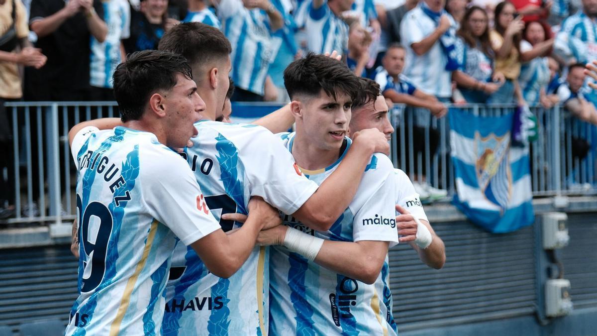 El Málaga CF celebra el gol de Antoñito Cordero ante el Granada.