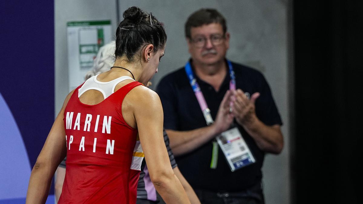 Carolina Marin of Spain is injured in the second set and leaves the match against Bing Jiao He of China during Women's Singles Semifinal of the Badminton on La Chapelle Arena Court 1 during the Paris 2024 Olympics Games on August 4, 2024 in Paris, France.