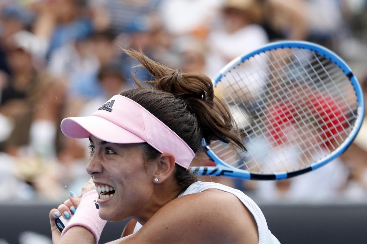 Tennis - Australian Open - First Round - Melbourne Park, Melbourne, Australia, January 15, 2019. Spainâ¿¿s Garbine Muguruza in action during the match against China’s Zheng Saisai. REUTERS/Aly Song