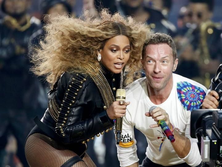 Beyonce and Chris Martin of Coldplay perform during the half-time show at the NFL's Super Bowl 50 between the Carolina Panthers and the Denver Broncos in Santa Clara