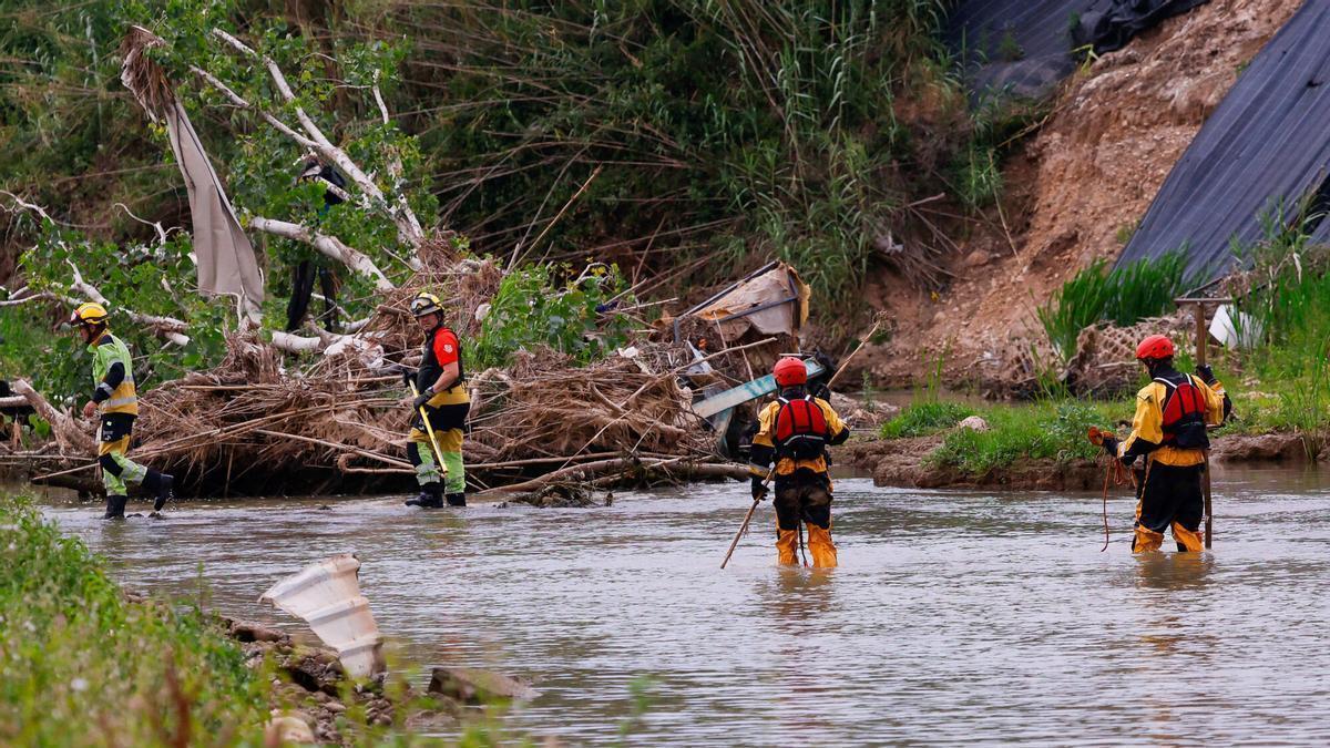 Bbúsqueda de una persona ahogada en el río Turia a la altura del azud de la acequia de Tormos el pasado año.