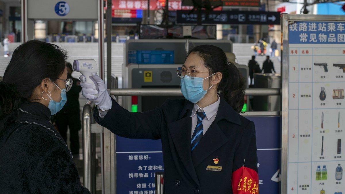 Control para detectar el contagio de coronavirus en la ciudad china de Nanning, el 28 de enero del 2020