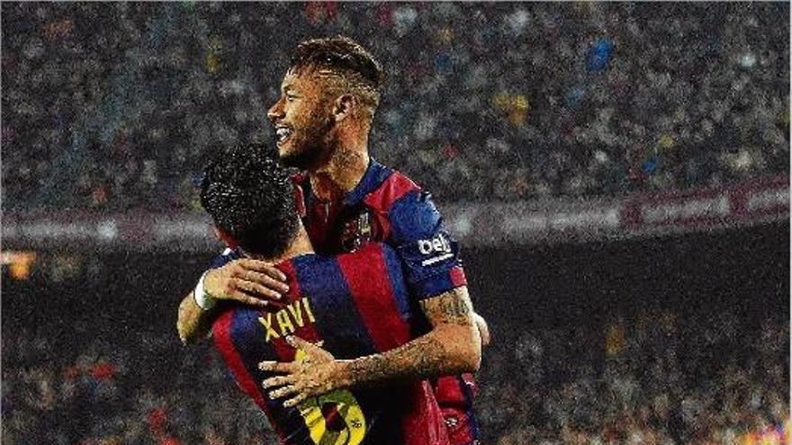 Neymar és abraçat per Xavi després del 2-1 a favor del Barça.