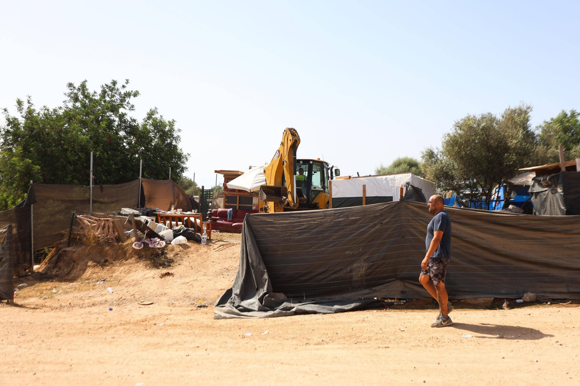 Todas las imágenes del desalojo de Can Rova 2 en Ibiza