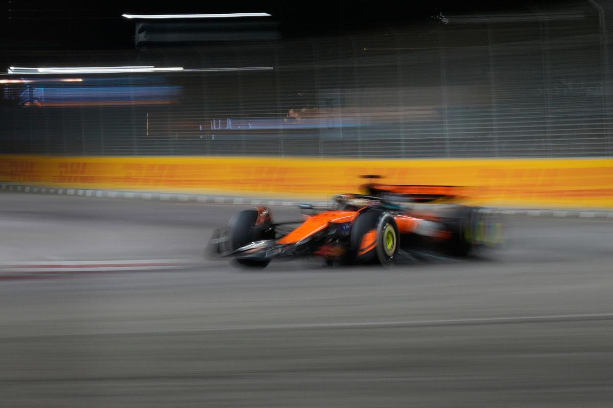 McLaren driver Oscar Piastri of Australia steers his car during the Singapore Formula One Grand Prix at the Marina Bay Street Circuit in Singapore, Sunday, Oct. 5, 2025. (AP Photo/Vincent Thian)