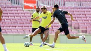 Piqué, en el entrenamiento del Barça