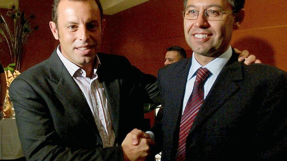 Sandro Rosell (i) y Josep María Bartomeu.