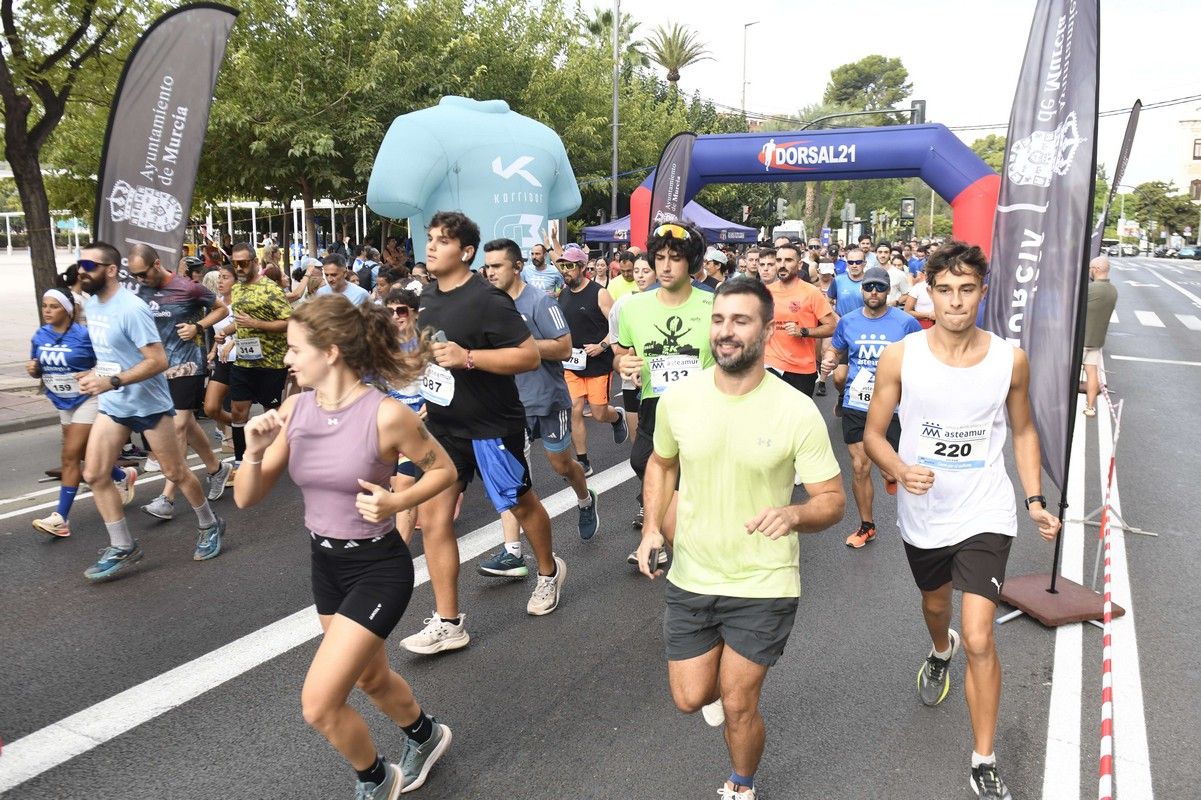La carrera y marcha Solidaria Asteamur, en imágenes