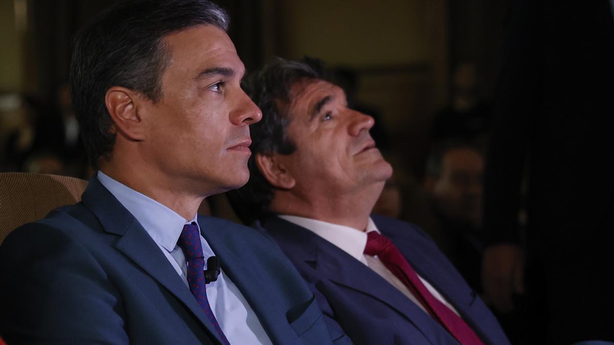 Pedro Sánchez y José Luis Escrivá.