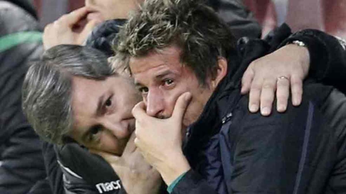 El presidente del Sporting CP consolando a Coentrao
