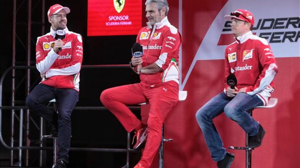 Sebastian Vettel, Kimmi Raikkonen y Mauricio Arrivabene