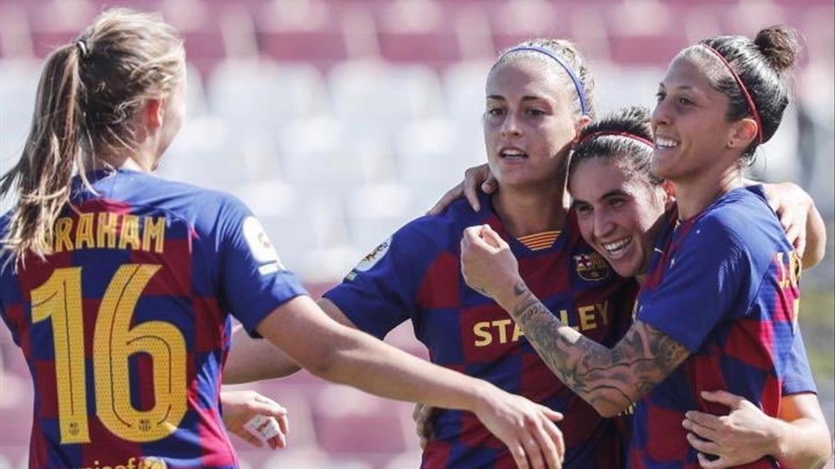 Las jugadoras del Barça celebran el 0-1 de Jenni Hermoso al Sevilla.