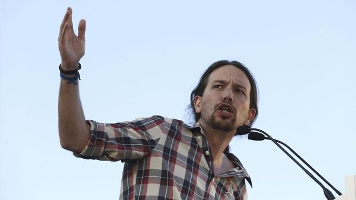 El secretario general de Podemos, Pablo Iglesias, en un mitin en Alcalá de Henares (Madrid).