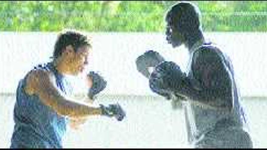 Sean Paris y Djimon Hounsou.