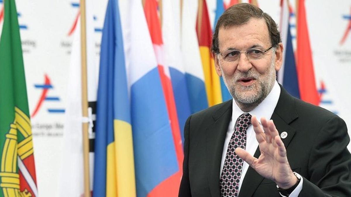 Mariano Rajoy saluda a su llegada a la cumbre del foro Asia-Europa (ASEM), en Milán, este viernes, 17 de octubre.