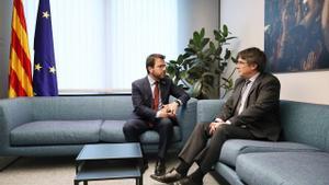 El presidente de la Generalitat, Pere Aragonès, reunido con el expresidente Carles Puigdemont en una imagen de archivo.