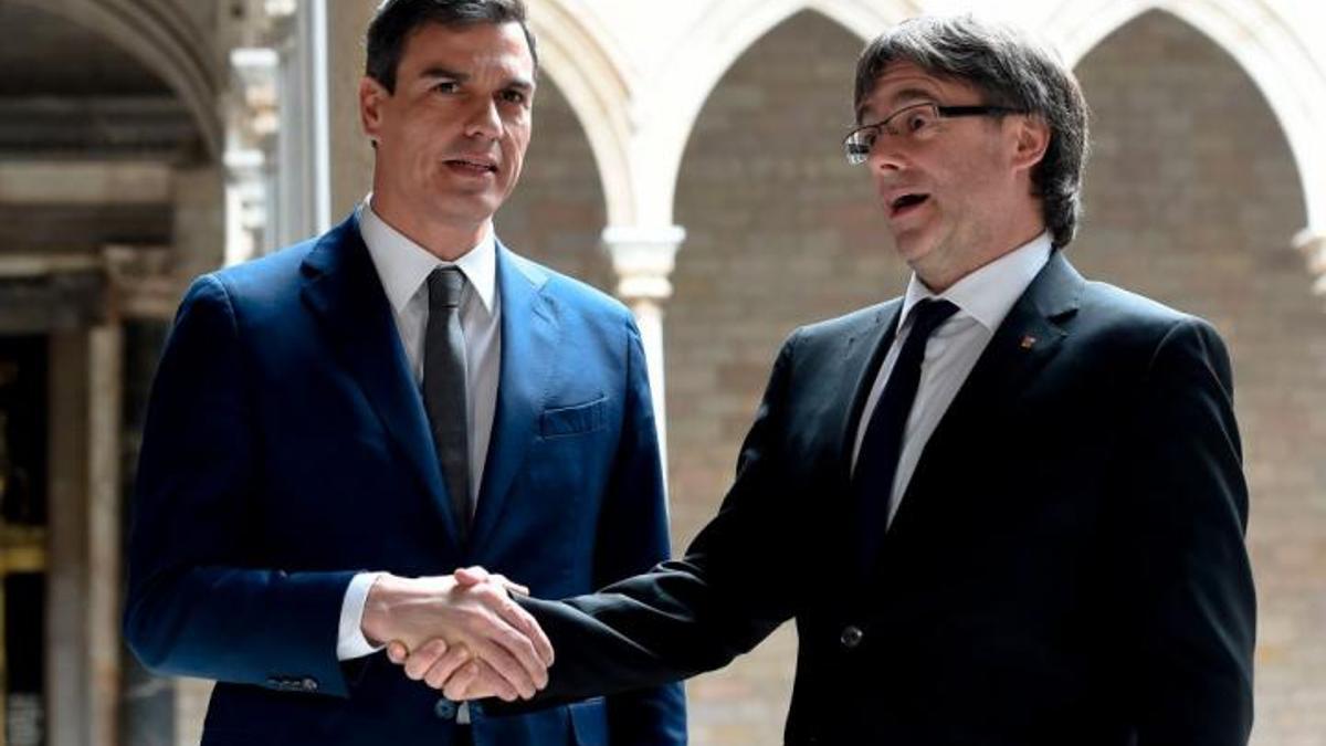 Sánchez y Puigdemont.