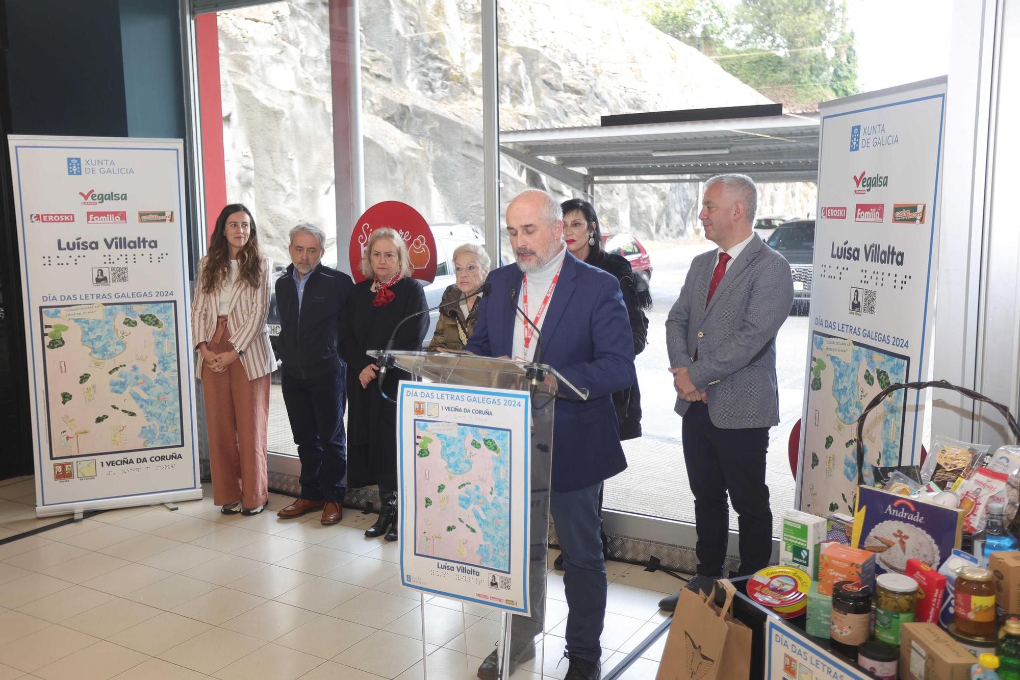 Vegalsa-Eroski homenaxea a Luísa Villalta con carteis e bolsas conmemorativas