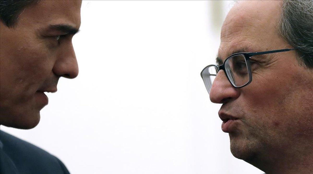 Pedro Sánchez y Quim Torra, durante su encuentro en Barcelona, el 20 de diciembre del 2018.