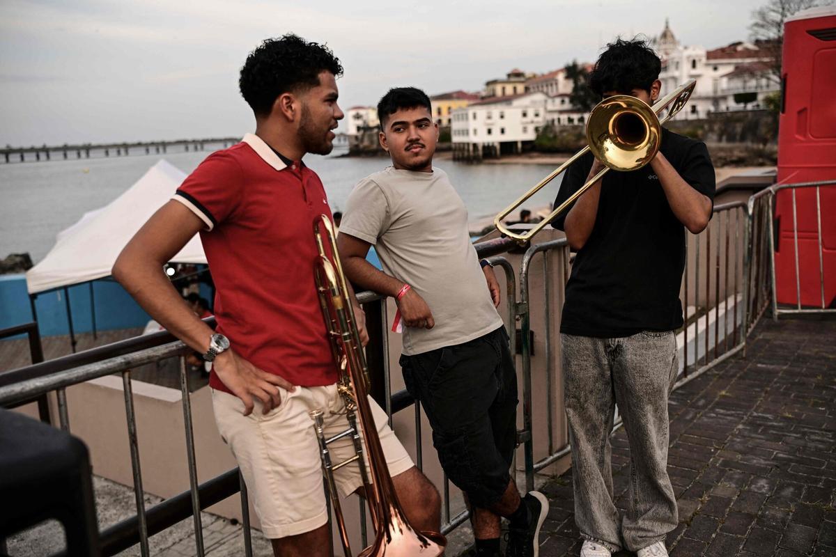 Three young Panamanian trombonists rehearse ahead of a tribute to US musician Willie Colon in Panama City on April 12, 2026. US musician Willie Colon died in Bronxville, New York, on February 21, 2026, at the age of 75.