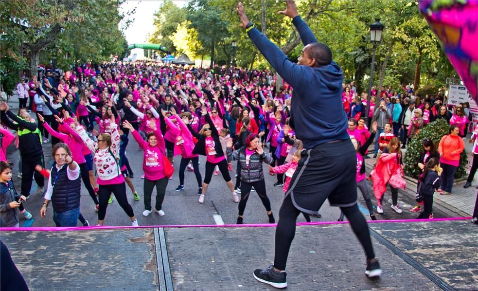 Las imágenes de la marcha y la carrera rosa de Cáceres