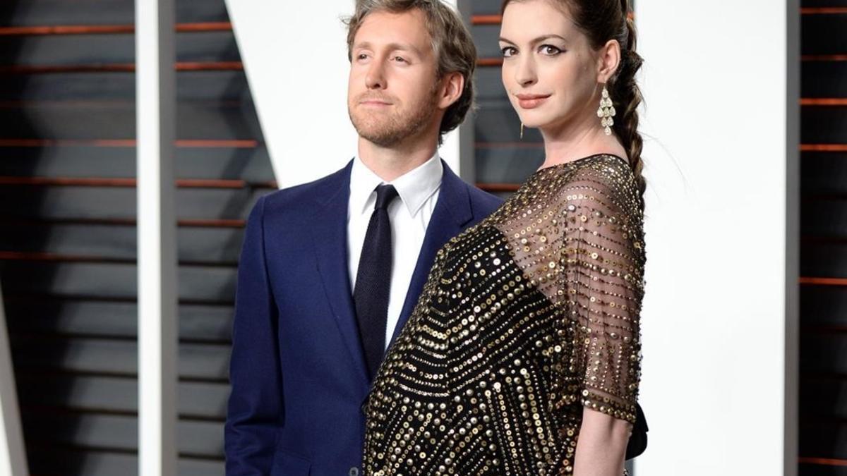 FILE- In this Feb  28  2016  file photo  Adam Shulman  left  and Anne Hathaway arrive at the Vanity Fair Oscar Party in Beverly Hills  Calif  E  reported Thursday  April 7  that the Oscar-winning star of  Les Miserables  and husband Adam Shulman welc