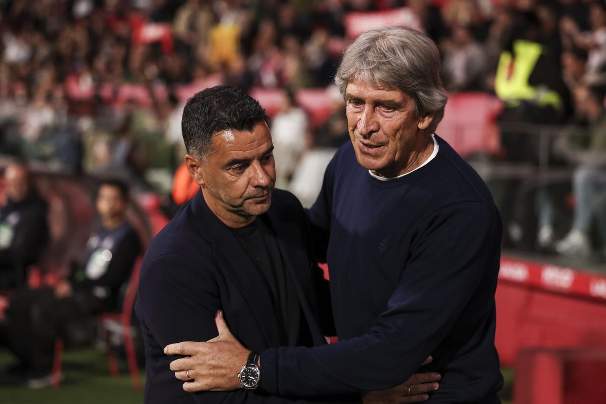 Míchel se saluda con Pellegrini
