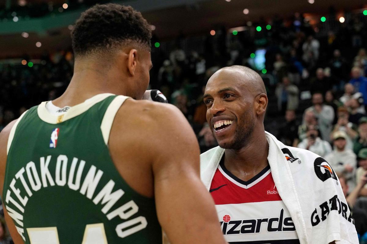 MILWAUKEE, WISCONSIN - OCTOBER 22: Giannis Antetokounmpo #34 of the Milwaukee Bucks and Khris Middleton #22 of the Washington Wizards talk after the Bucks defeated the Wizards 133-120 at Fiserv Forum on October 22, 2025 in Milwaukee, Wisconsin. NOTE TO USER: User expressly acknowledges and agrees that, by downloading and or using this photograph, User is consenting to the terms and conditions of the Getty Images License Agreement. Patrick McDermott/Getty Images/AFP (Photo by Patrick McDermott / GETTY IMAGES NORTH AMERICA / Getty Images via AFP). NOTE TO USER: User expressly acknowledges and agrees that, by downloading and or using this photograph, User is consenting to the terms and conditions of the Getty Images License Agreement