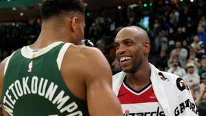 MILWAUKEE, WISCONSIN - OCTOBER 22: Giannis Antetokounmpo #34 of the Milwaukee Bucks and Khris Middleton #22 of the Washington Wizards talk after the Bucks defeated the Wizards 133-120 at Fiserv Forum on October 22, 2025 in Milwaukee, Wisconsin. NOTE TO USER: User expressly acknowledges and agrees that, by downloading and or using this photograph, User is consenting to the terms and conditions of the Getty Images License Agreement. Patrick McDermott/Getty Images/AFP (Photo by Patrick McDermott / GETTY IMAGES NORTH AMERICA / Getty Images via AFP). NOTE TO USER: User expressly acknowledges and agrees that, by downloading and or using this photograph, User is consenting to the terms and conditions of the Getty Images License Agreement