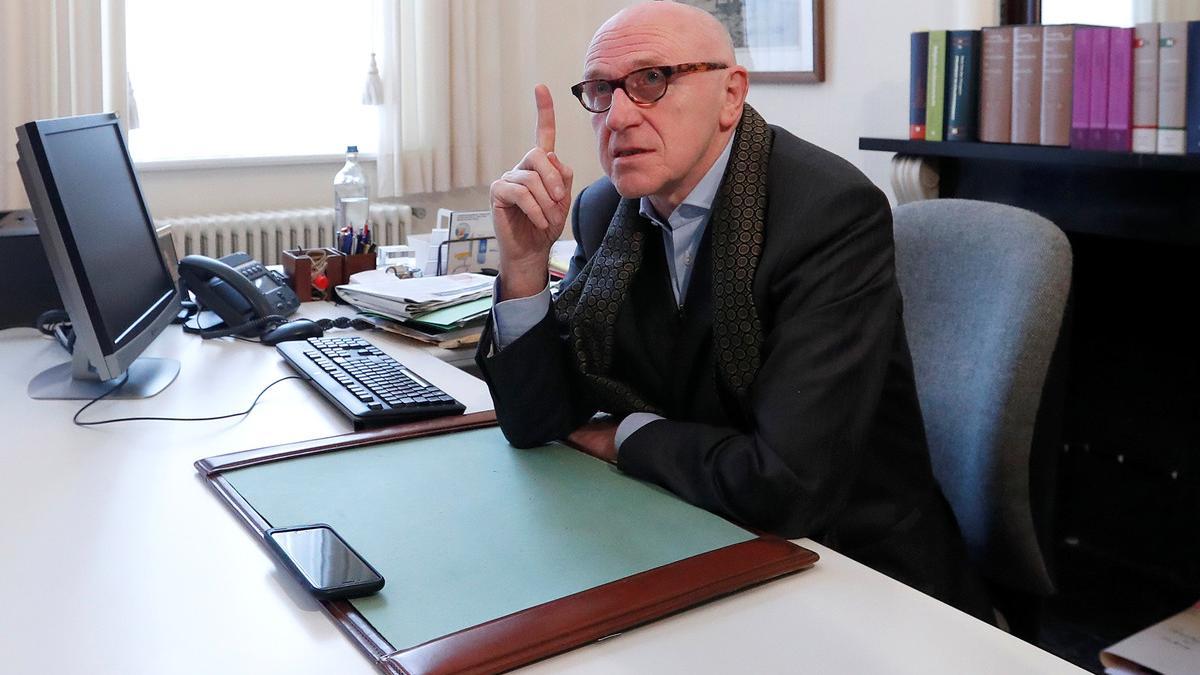 Sacked Catalan leader Carles Puigdemont's Belgian lawyer, Paul Bekaert, speaks in his office in Tielt in Belgium