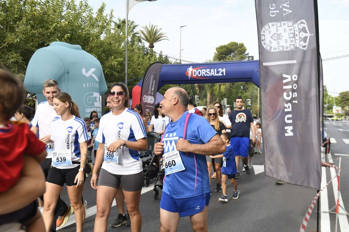 La carrera y marcha Solidaria Asteamur, en imágenes