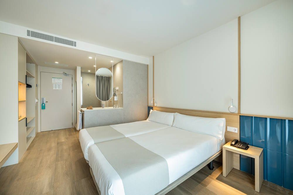 Una de las increíbles habitaciones de Port Hotels donde difrutar unos días de relax