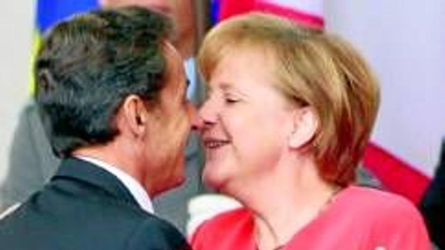 El pacto de Merkel y Sarkozy sobre Grecia proporciona calma a España