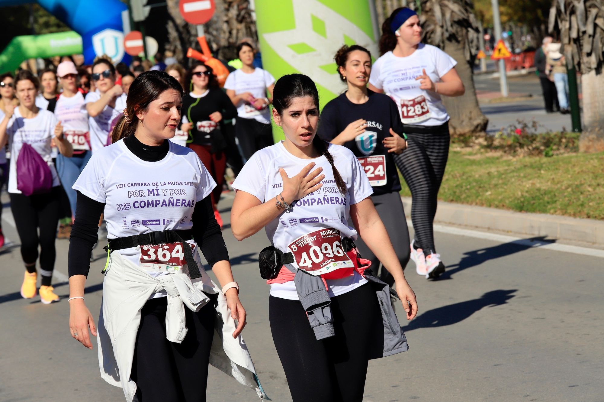 La salida y el recorrido de la Carrera de la Mujer 'inmortalizados' en imágenes